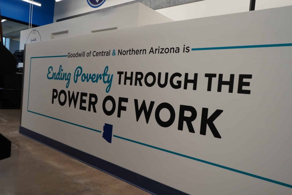 Goodwill AZ | "Power of Work" sign