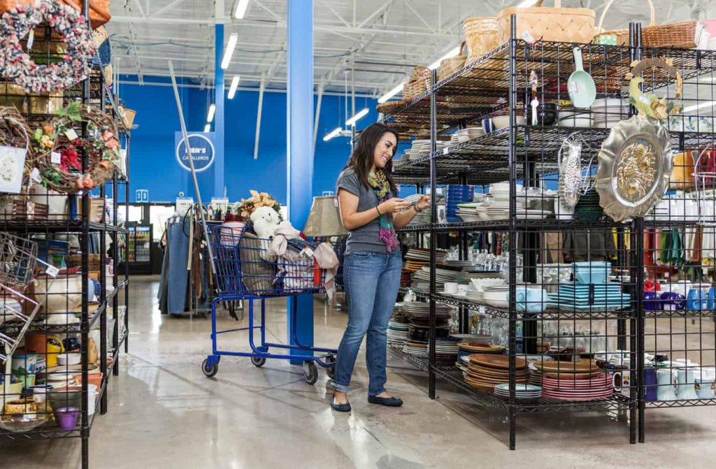 Goodwill AZ | Women looking at racks of home decor