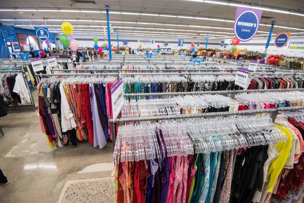 Goodwill AZ | Racks of women's clothing in store