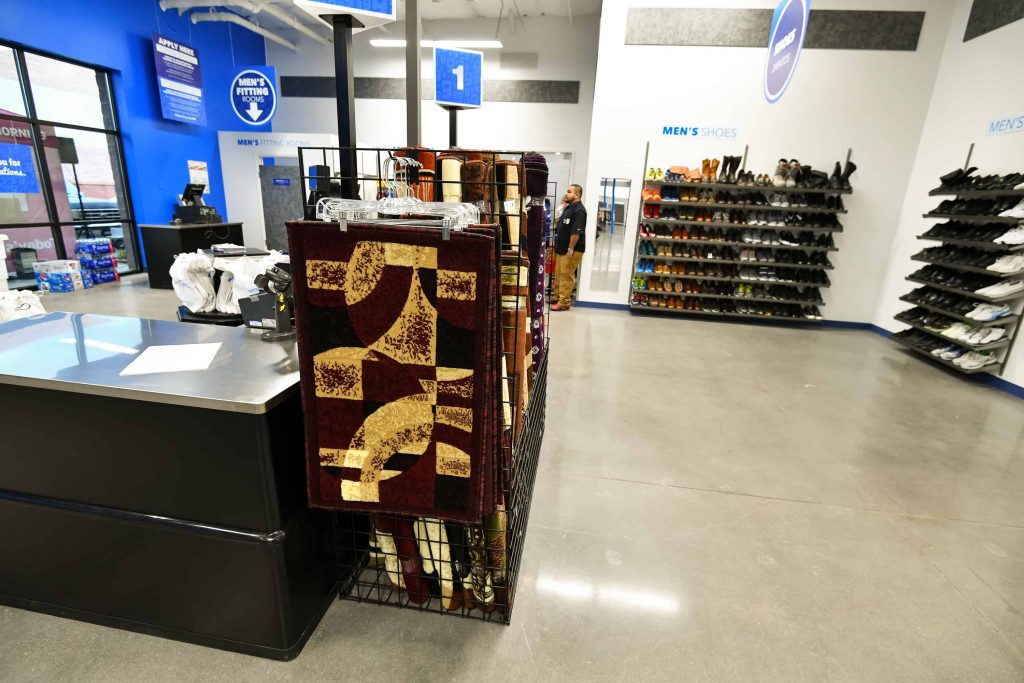 Goodwill AZ | Rugs and shoes in a store