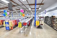 Goodwill AZ | Racks of clothing in store