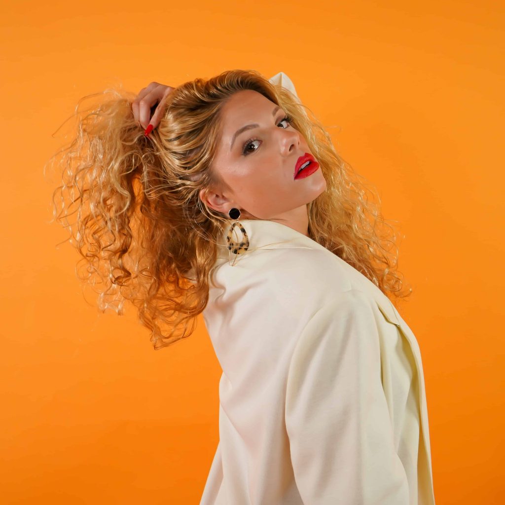 Goodwill AZ | Women in white blazer