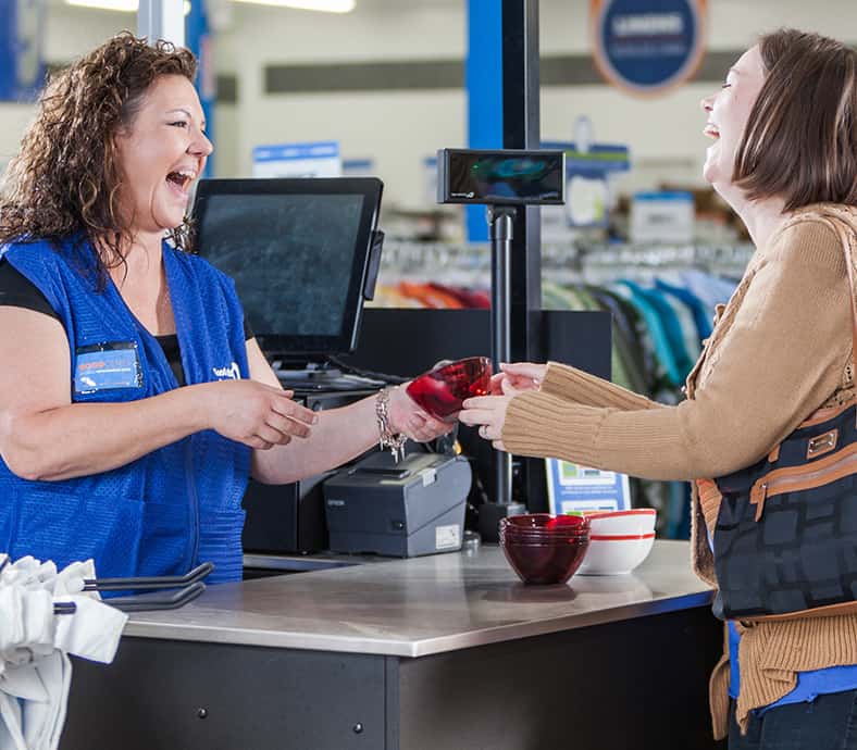 Goodwill AZ | Two women at the cash register smiling