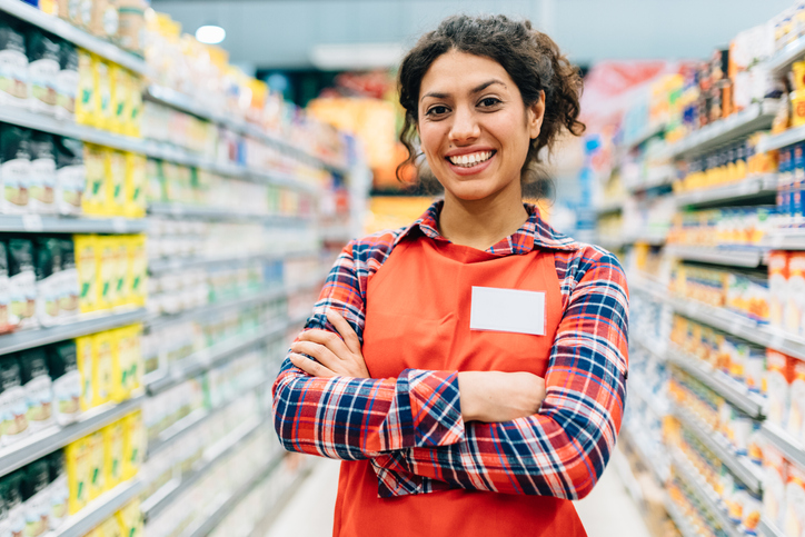 Portrait of supermarket stocker working