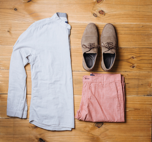 Flat lay of men casual fashion outfits on wooden background, Top view