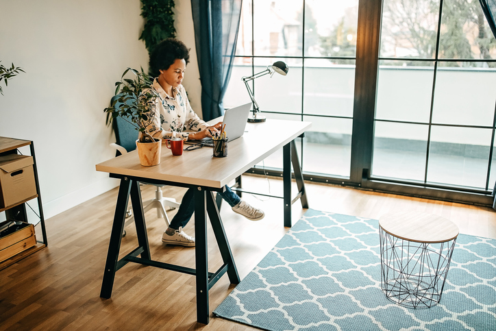 Busy business woman working from home office