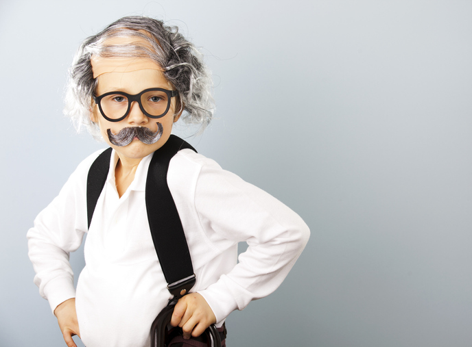 Little boy dressed as an old man.