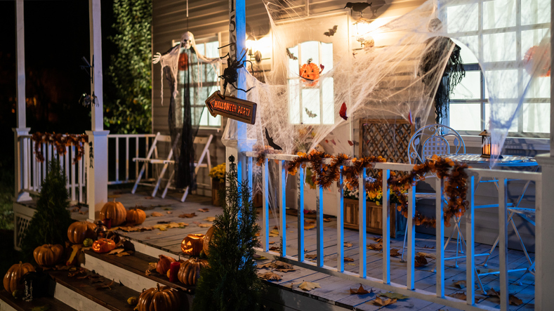 Halloween Jack-o-Lantern Pumpkins on a porch stairs