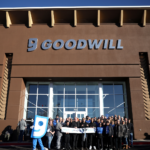 Group of people outside the Flagstaff Goodwill opening