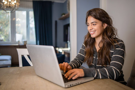 Woman working on her laptop computer