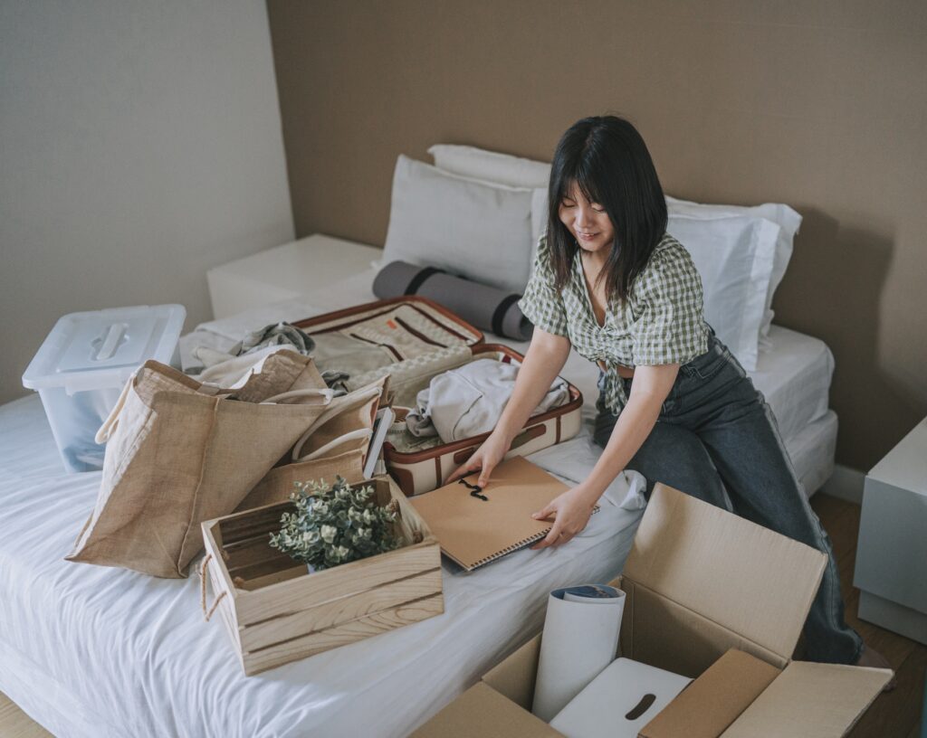 woman decluttering unpacking