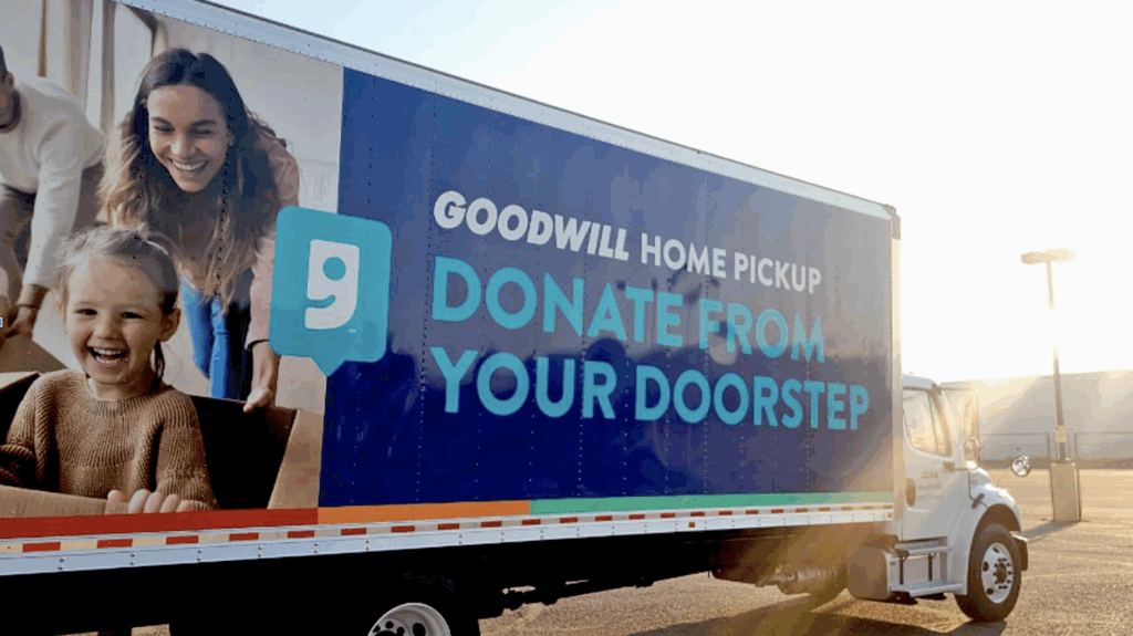 A truck with a Goodwill donations wrap