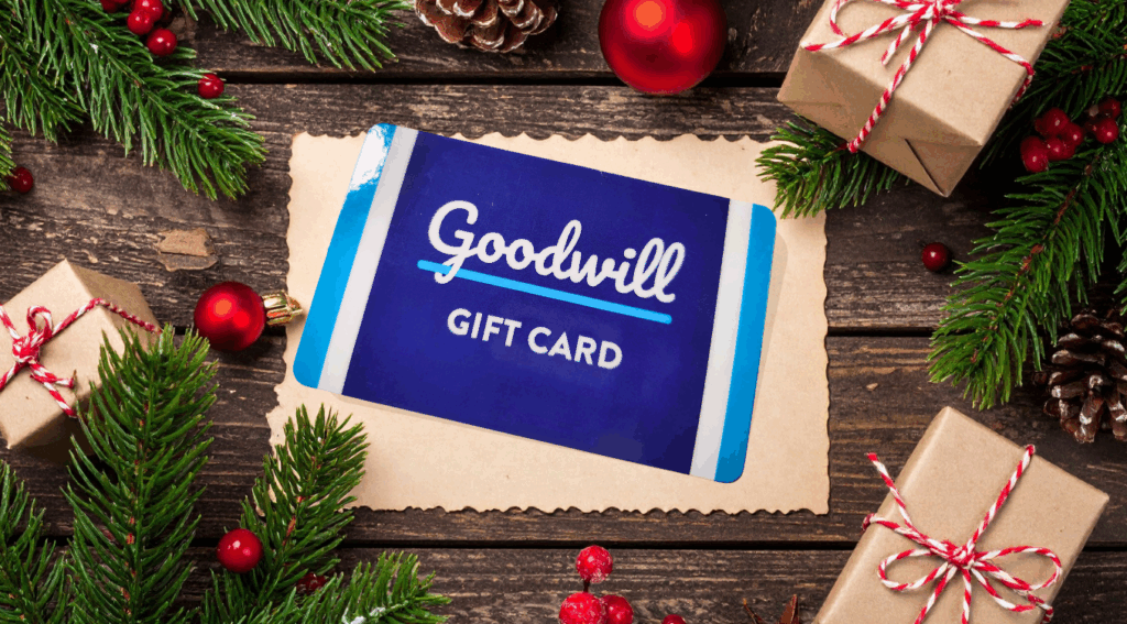A Goodwill gift card on a table