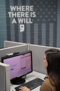Woman using a computer at the Veteran Career Center